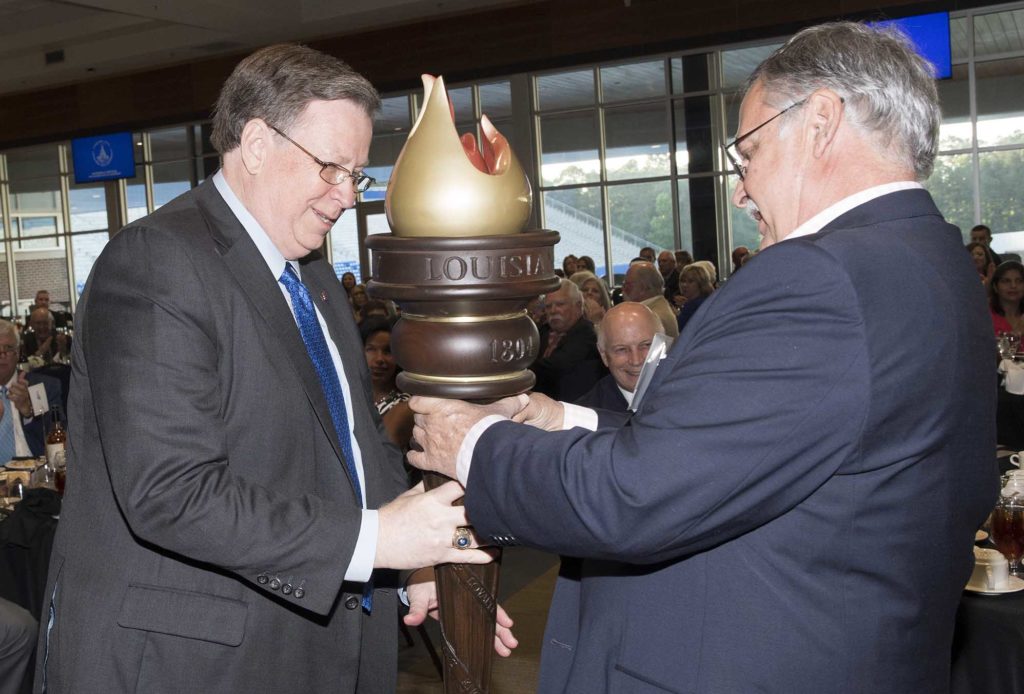 Mitch Mitton presenting Dr. Guice with the new mace at the 2019 Benefactor's Dinner.