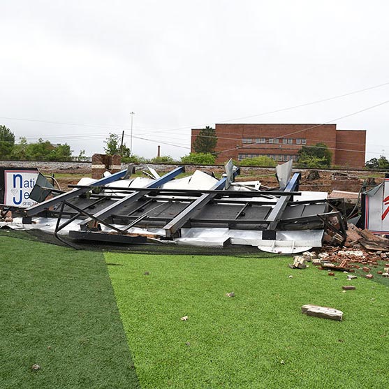 The baseball scoreboard toppled by the tornado.