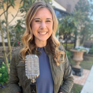 Madison Kaufman holding her 2019 Student Broadcaster of the Year Award.