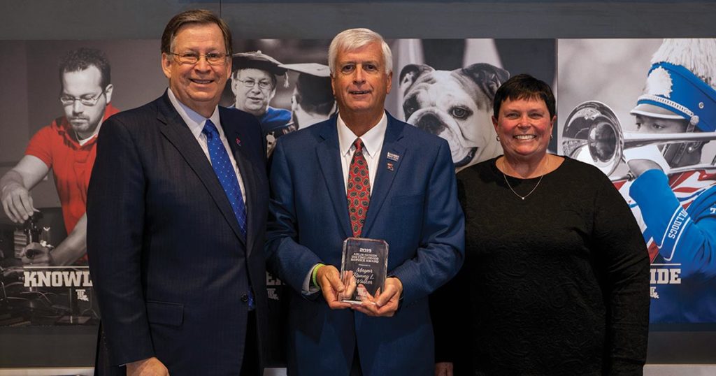 Dr. Guice and Cathi Cox-Boniol present Ruston Mayor Ronny Walker with the Arlis D. Scogin Distinguished Service Award.