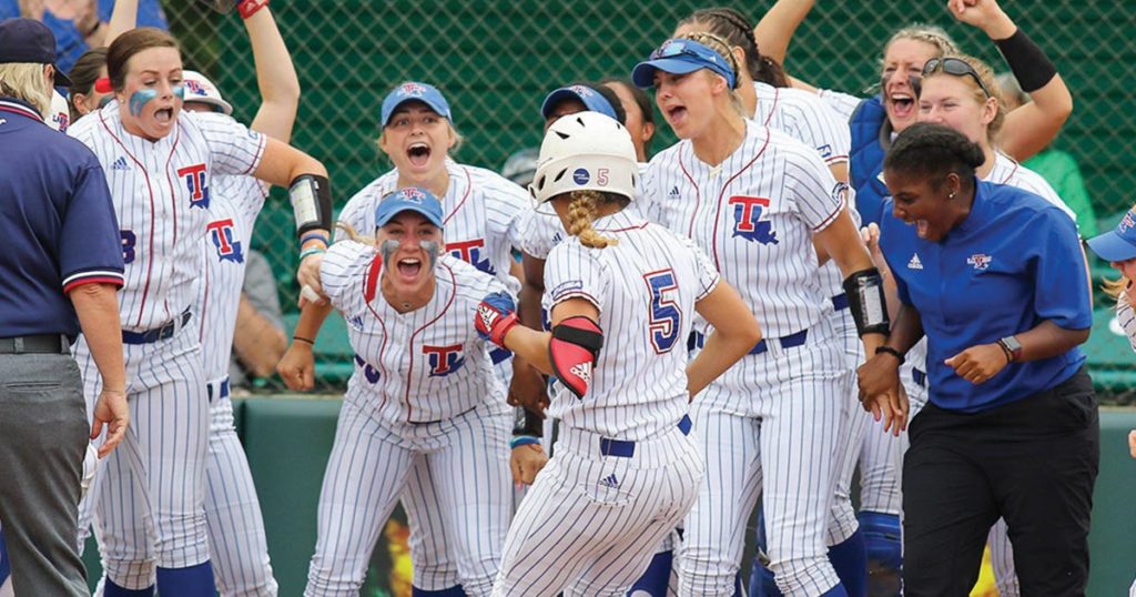 Lady Techsters softball scoring against Marshall.