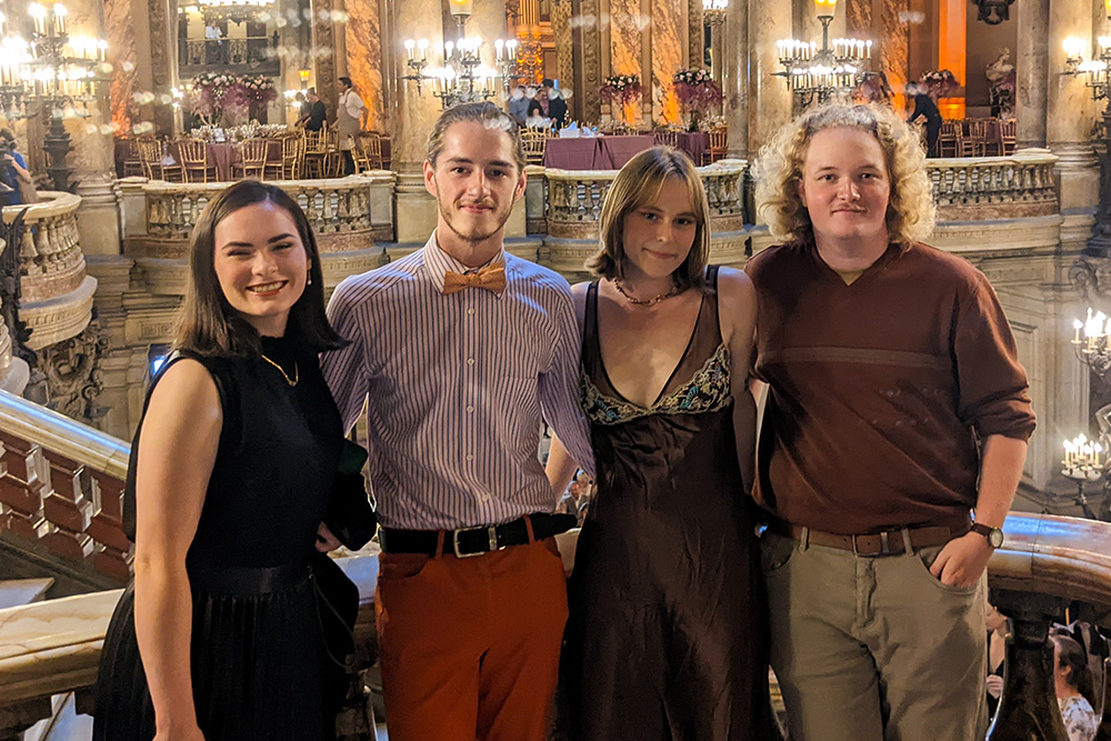 Jesse Webb pictured with other Tech students studying abroad at the Paris Opera House.