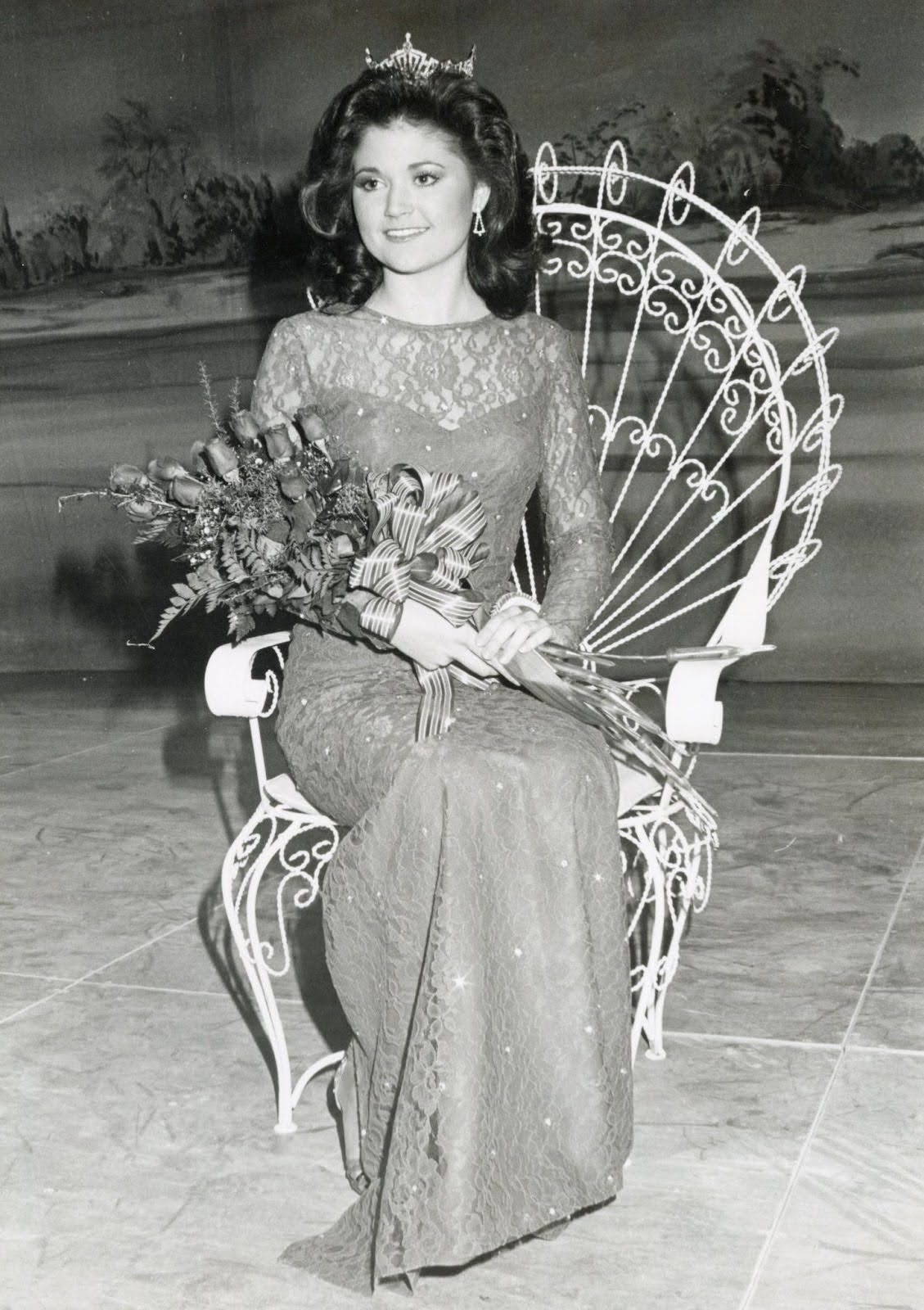 Black and white photo of a past homecoming queen