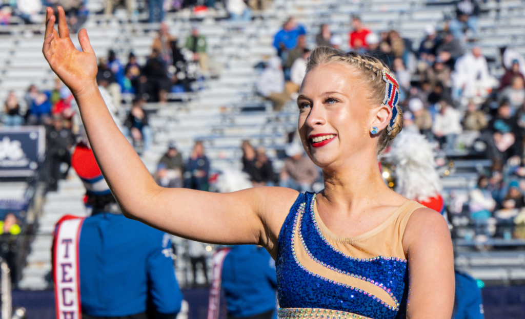 Tess Gardner during her halftime performance on the football field 